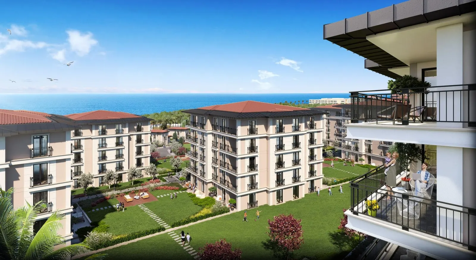 Deniz Istanbul Sedef Konaklari blocks and lawns with the sea in the distance