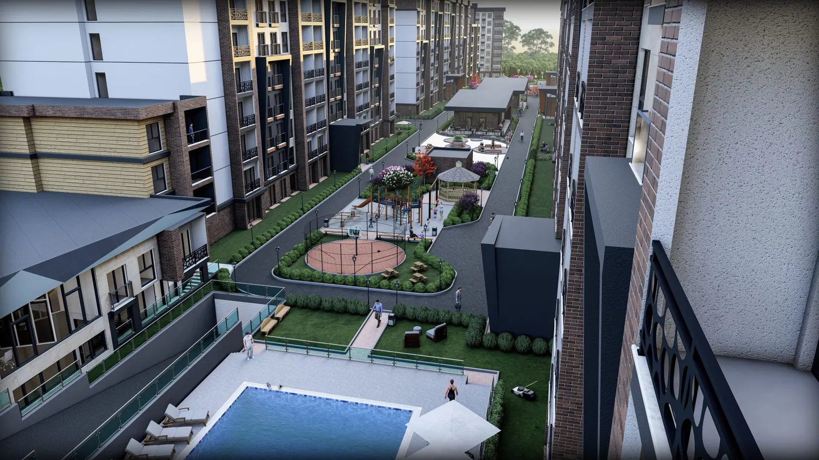 Courtyard with the pool between the blocks at Dilek Life Mahall