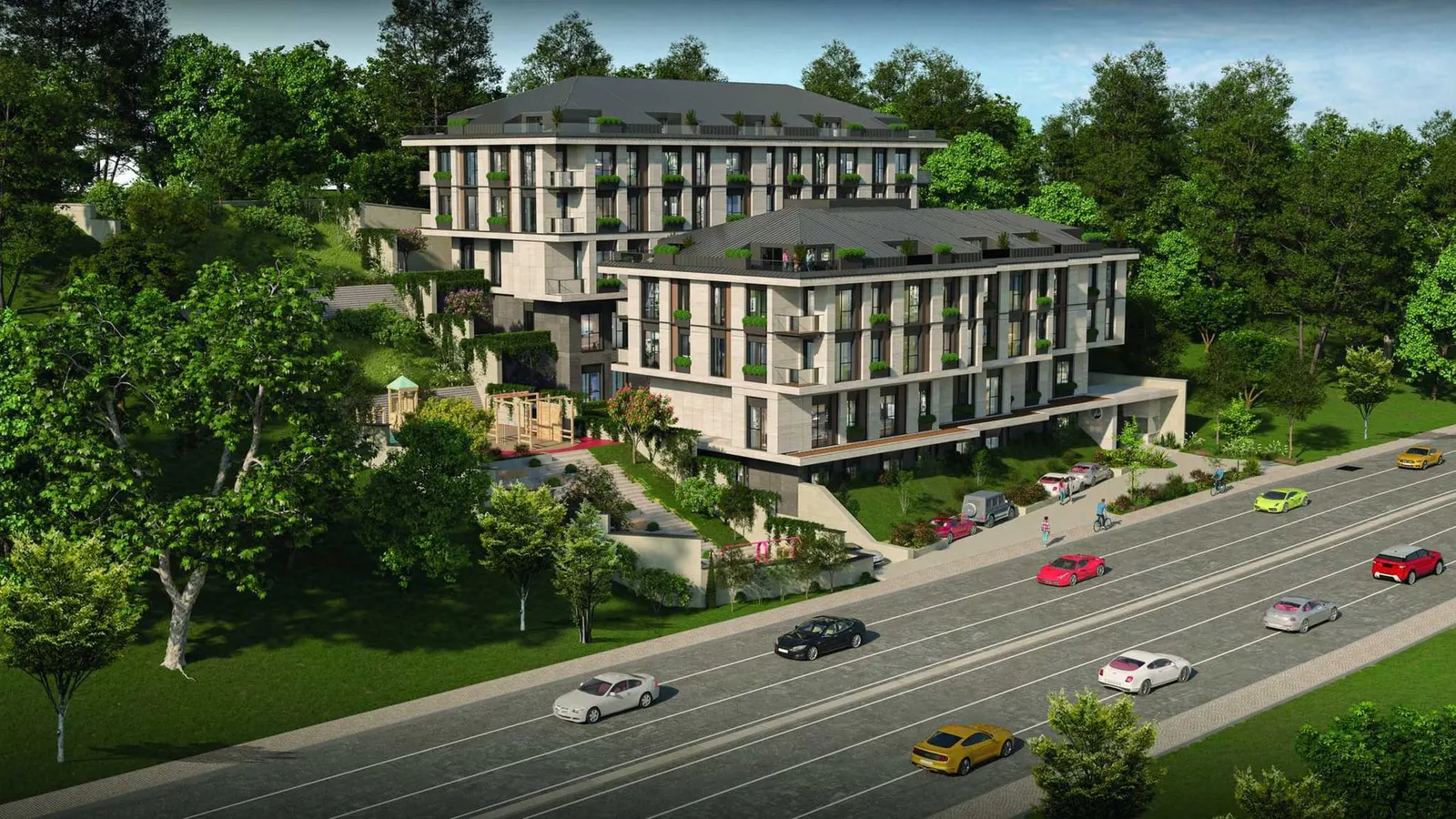 The two Elysium Residence Cubuklu blocks on the hillside above the road