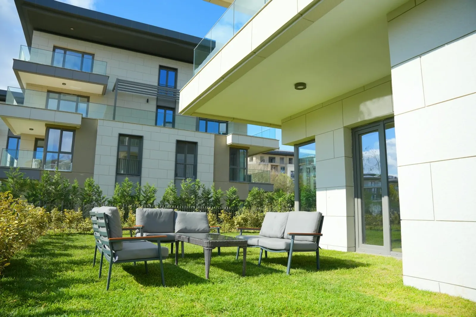 Garden terrace of a ground-floor apartment at Emlak Konut Cinarkoy Evleri