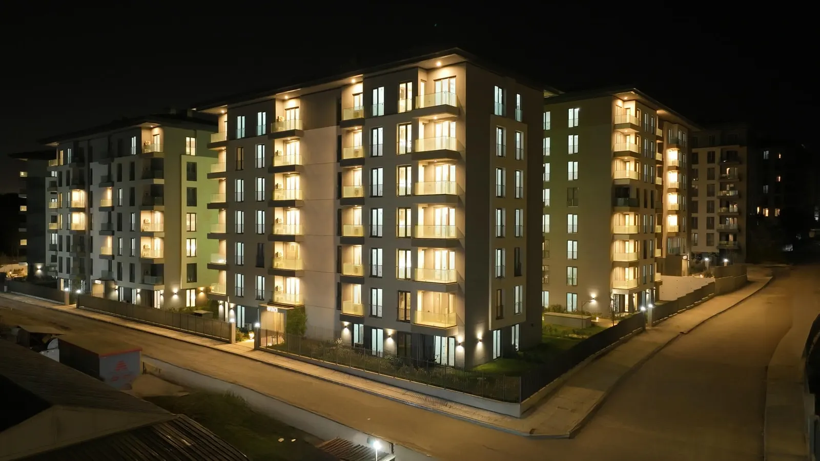 Emlak Konut Cinarkoy Evleri blocks at night