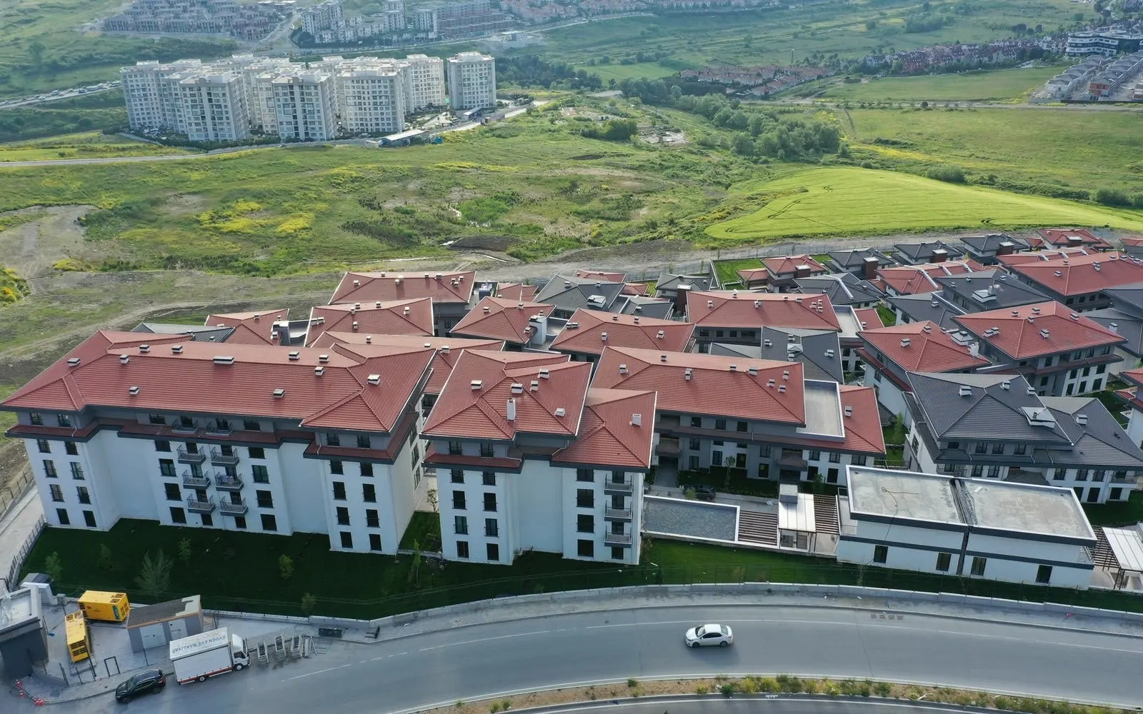 Apartment blocks beside the road at Emlak Konut Vadi Evleri