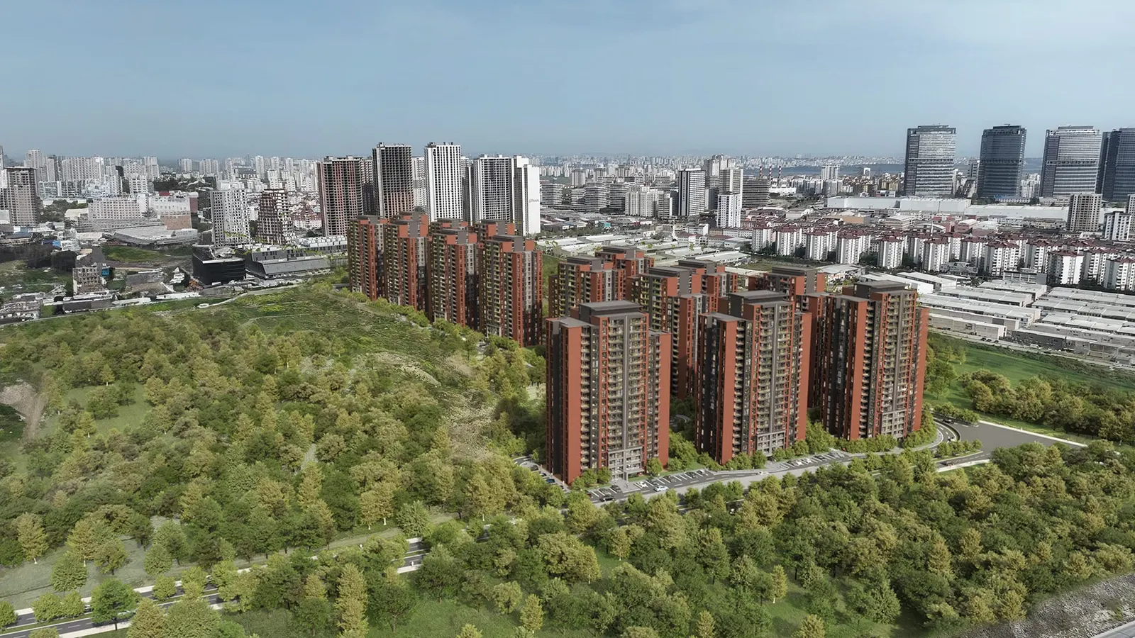 Natura Ferce towers beside a wooded hillside