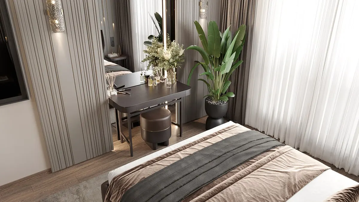 Bedroom with a desk in a Natura Ferce apartment