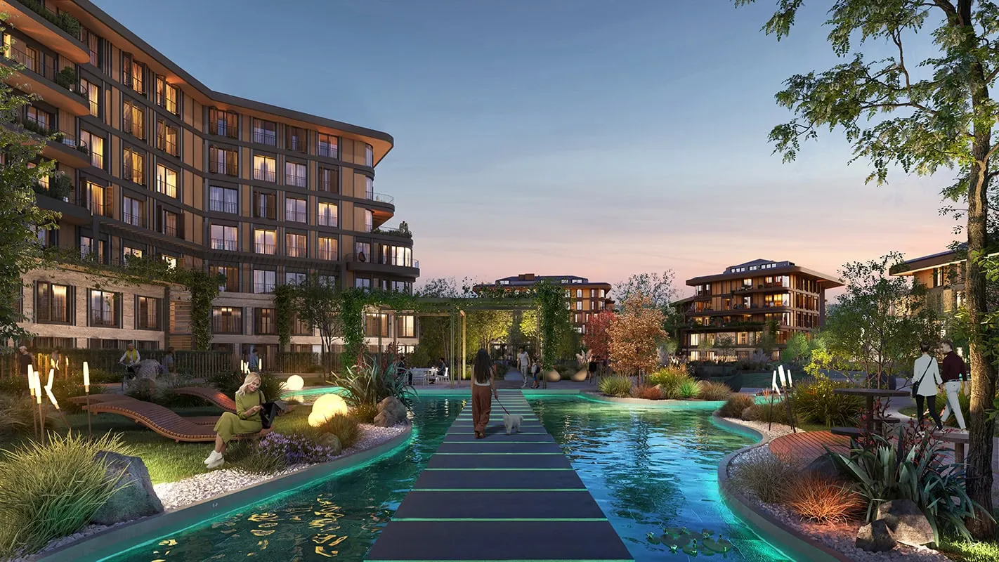 Walkway across the pond at Next Level Kemer at dusk