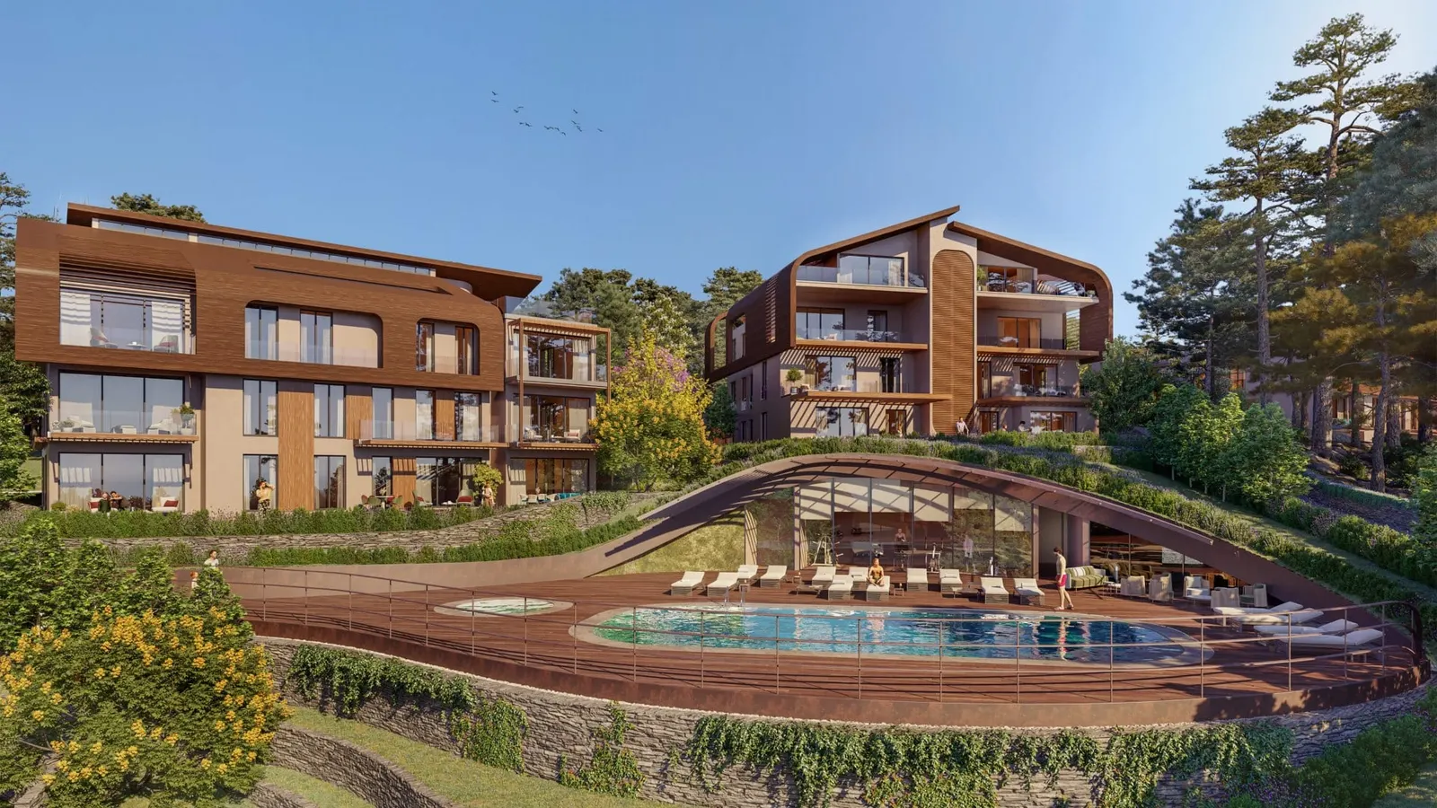 Outdoor pool and sun deck at OrmanYaka