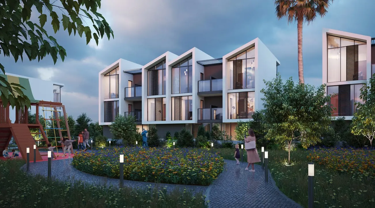 Garden path and playground in front of a Sylvana Istanbul townhouse row