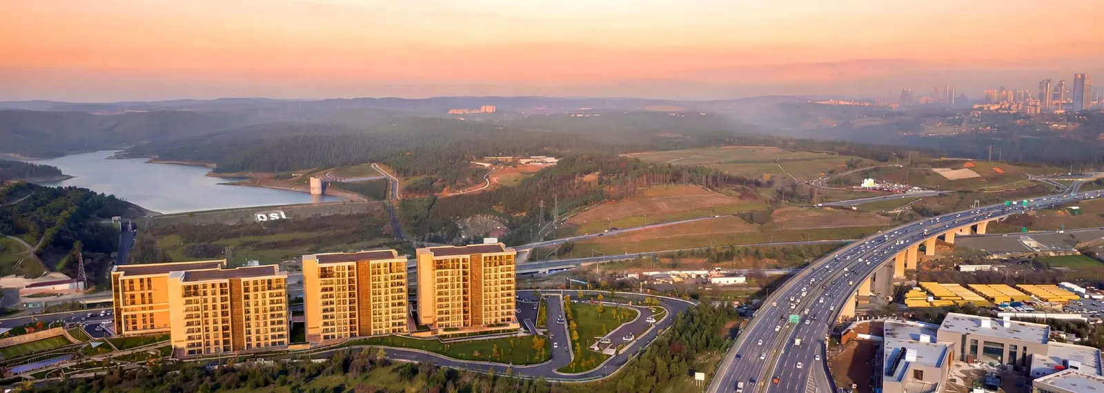 Aerial view of the V Yesilada site beside the lake and the motorway